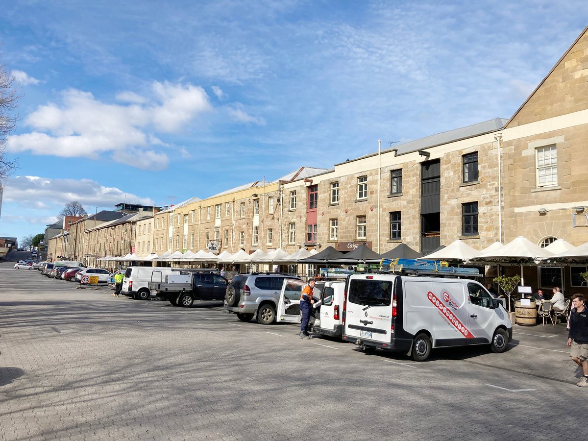 Vans parked along a UK waterfront street